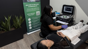 Technician performing a REMS bone density scan on a patient at a Precision Bone Imaging clinic, illustrating expert guidelines for bone density scan frequency.